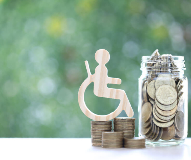 man-wheelchair-gold-coin-money-glass-bottle-natural-green-background (1)