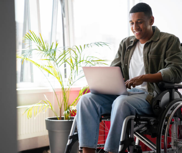 man-wheelchair-having-office-job (1)